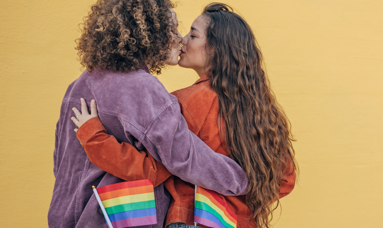 Lesbians protesting with a sign that says "lesbian power"