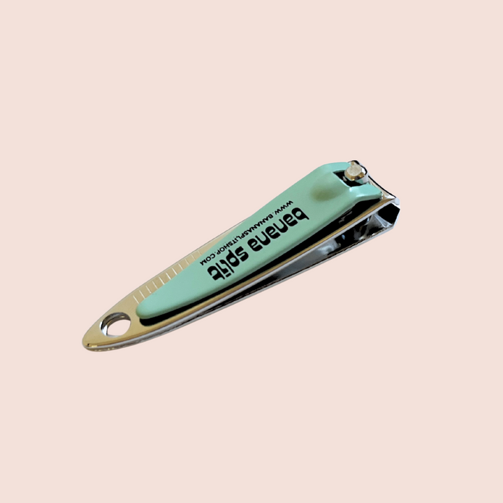 Nail clipper with a light green handle that reads "Banana Split" 