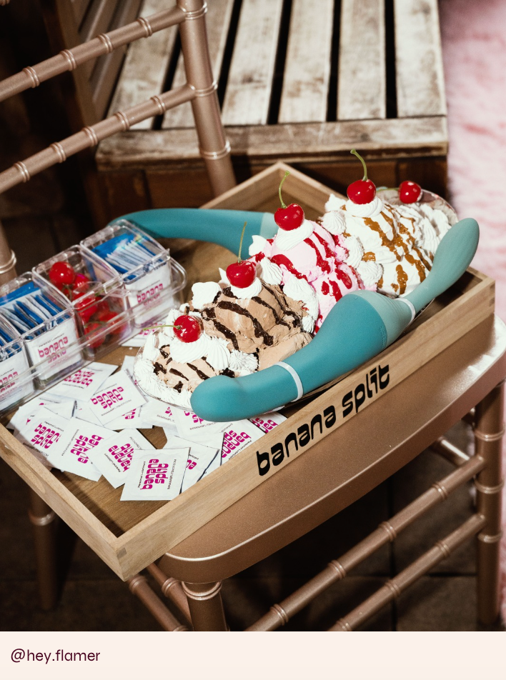 Banana Split sapphic vibrator on a tray with icecream and toppings