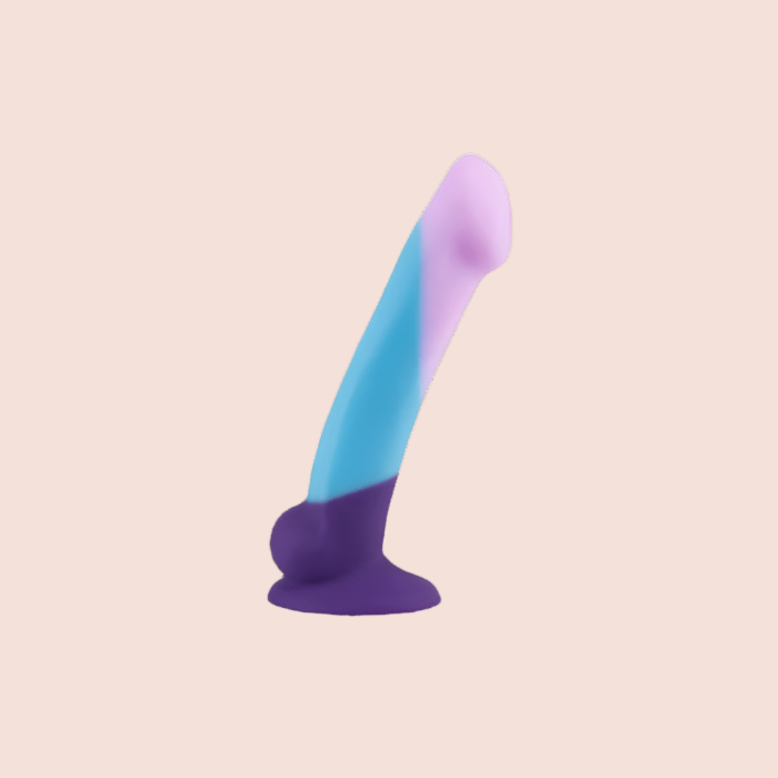 The Blush Avant Purple Haze D16 Silicone Dildo in the colors blue, lavender, and indigo.