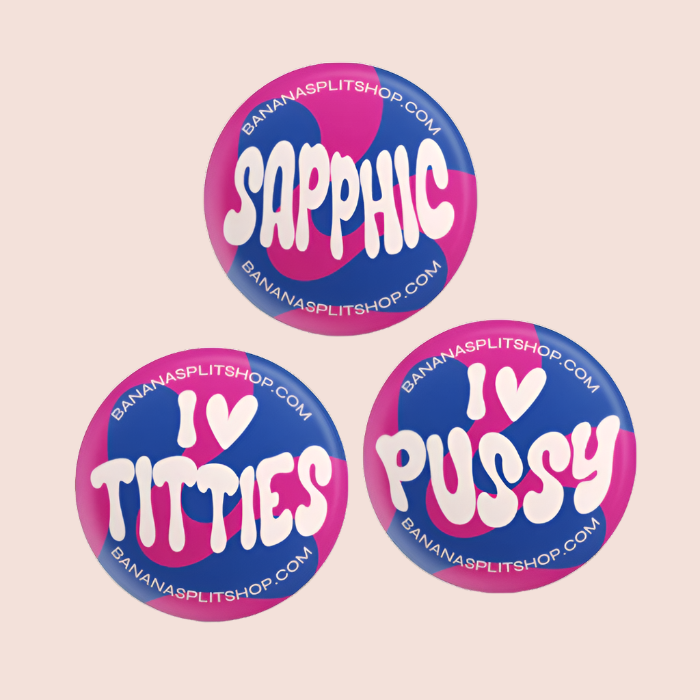 Set of 3 Pink and Blue Banana Split Pins that say "Sapphic," "I Heart Titties," and "I heart Pussy" as well as our website URL. The background is a blue and pink swirl pattern. 