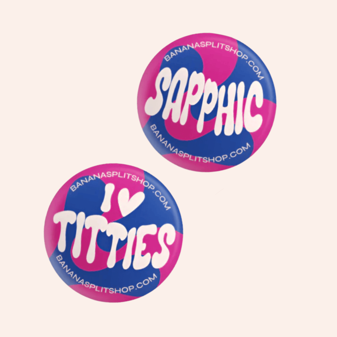 Banana Split Sapphic pin set in pink and blue: "I ❤ Titties" and "Sapphic."