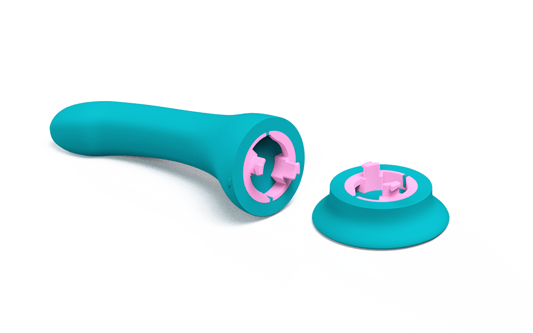 Rendering of the Banana teal vibrating dildo showing the suction cup base detached and the pink coupling mechanism.