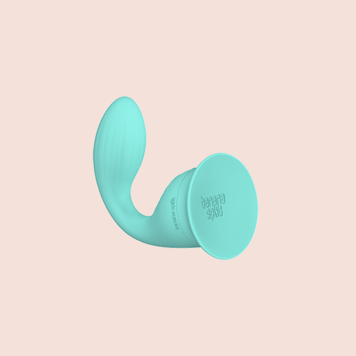 Rendering of the Dollop, mint colored dual-motor vibrator.