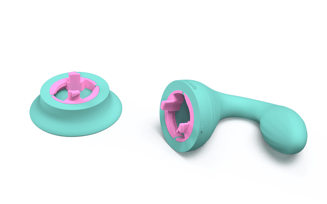 Rendering of the Dollop, mint colored vibrator detached from its suction cup, showing pink internal coupling mechanism.